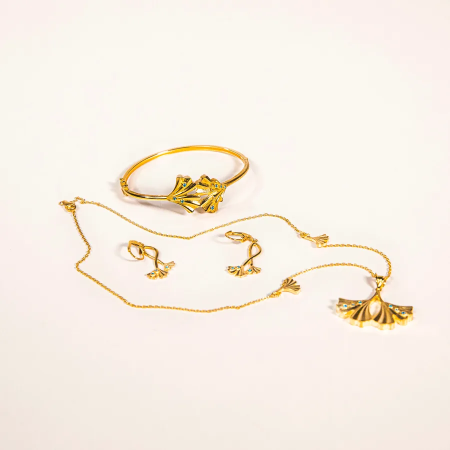 Bracelet, collier et boucles en or